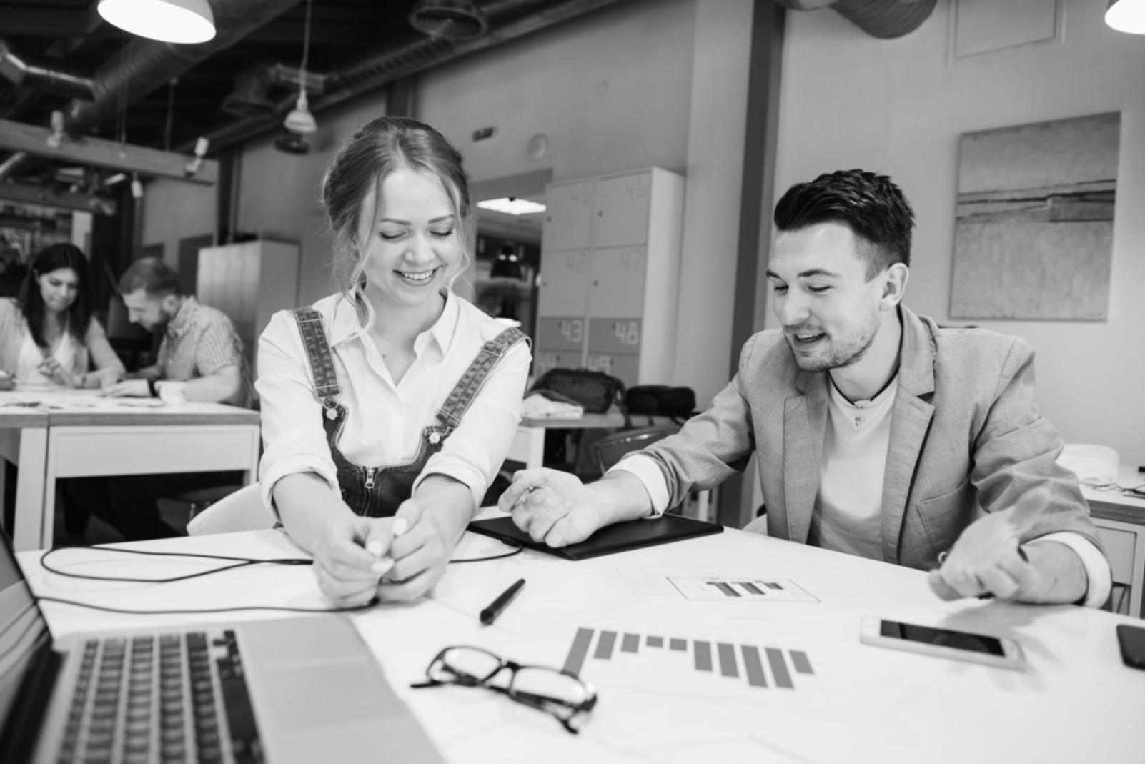 Financial planning session with charts and graphs showing savings progress